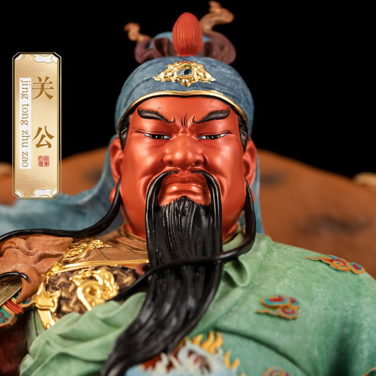 Close-up of brass Guan Yu statue, detailed face and headdress