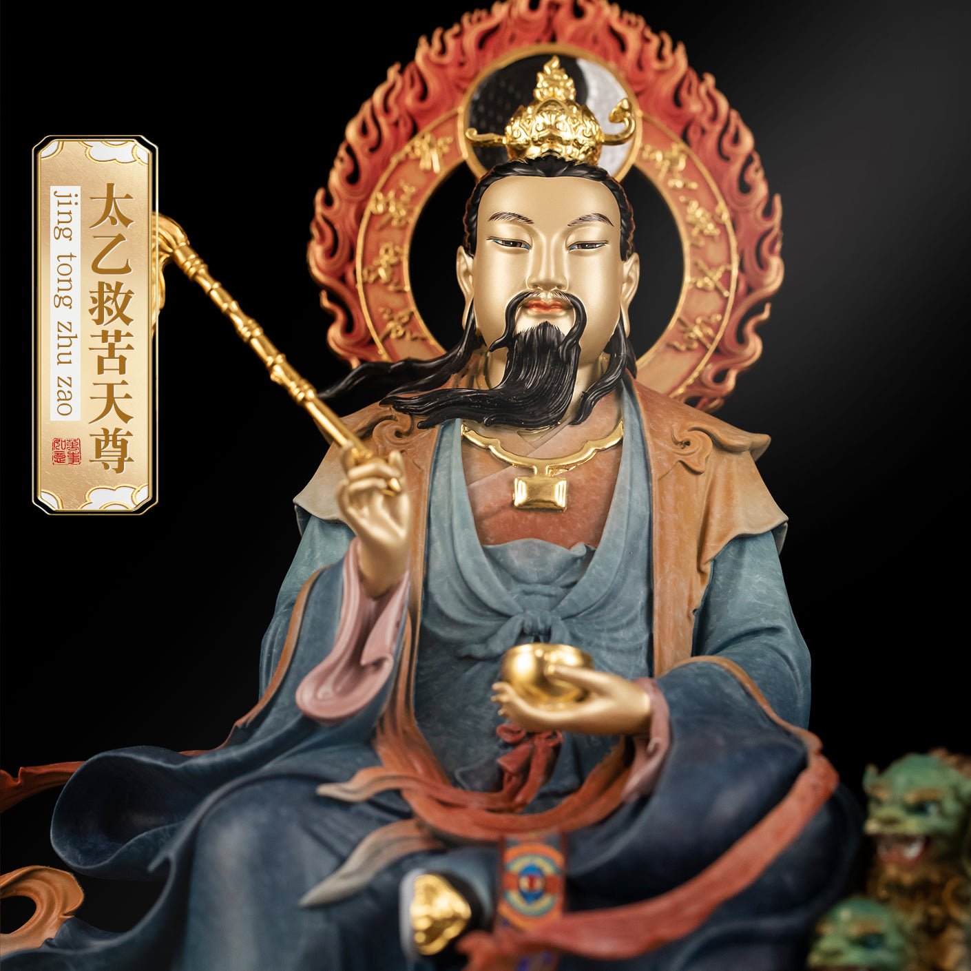 Close-up of brass Tai Yi Tian Zun statue, detailed face and headdress