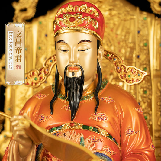 Close-up of brass Wen Chang statue, detailed face and official hat