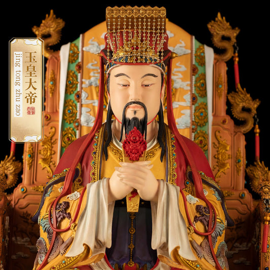 Close-up of brass Jade Emperor statue, detailed face and imperial crown