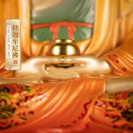 Brass Buddha statue, close-up of hands and offering bowl, enamel details