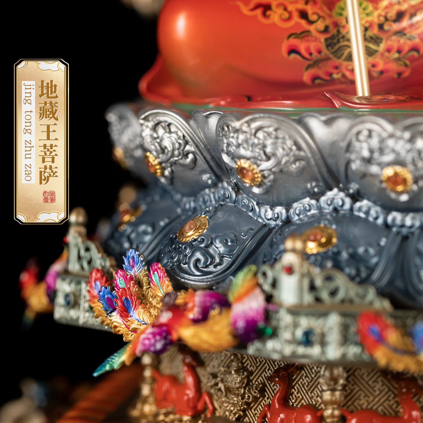 Ksitigarbha statue base, decorated with offerings, enamel details
